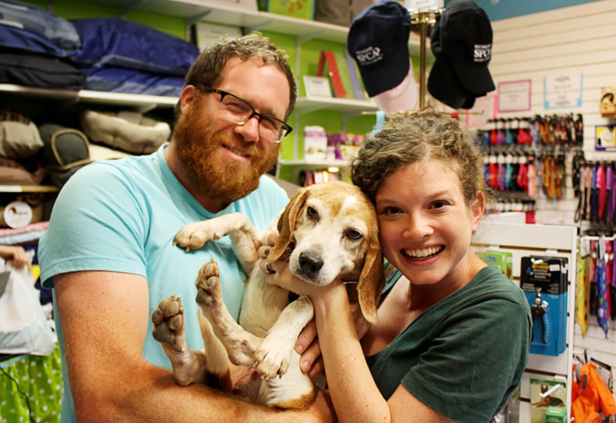 Adopters and dog at Maddie's Pet Adoption Days